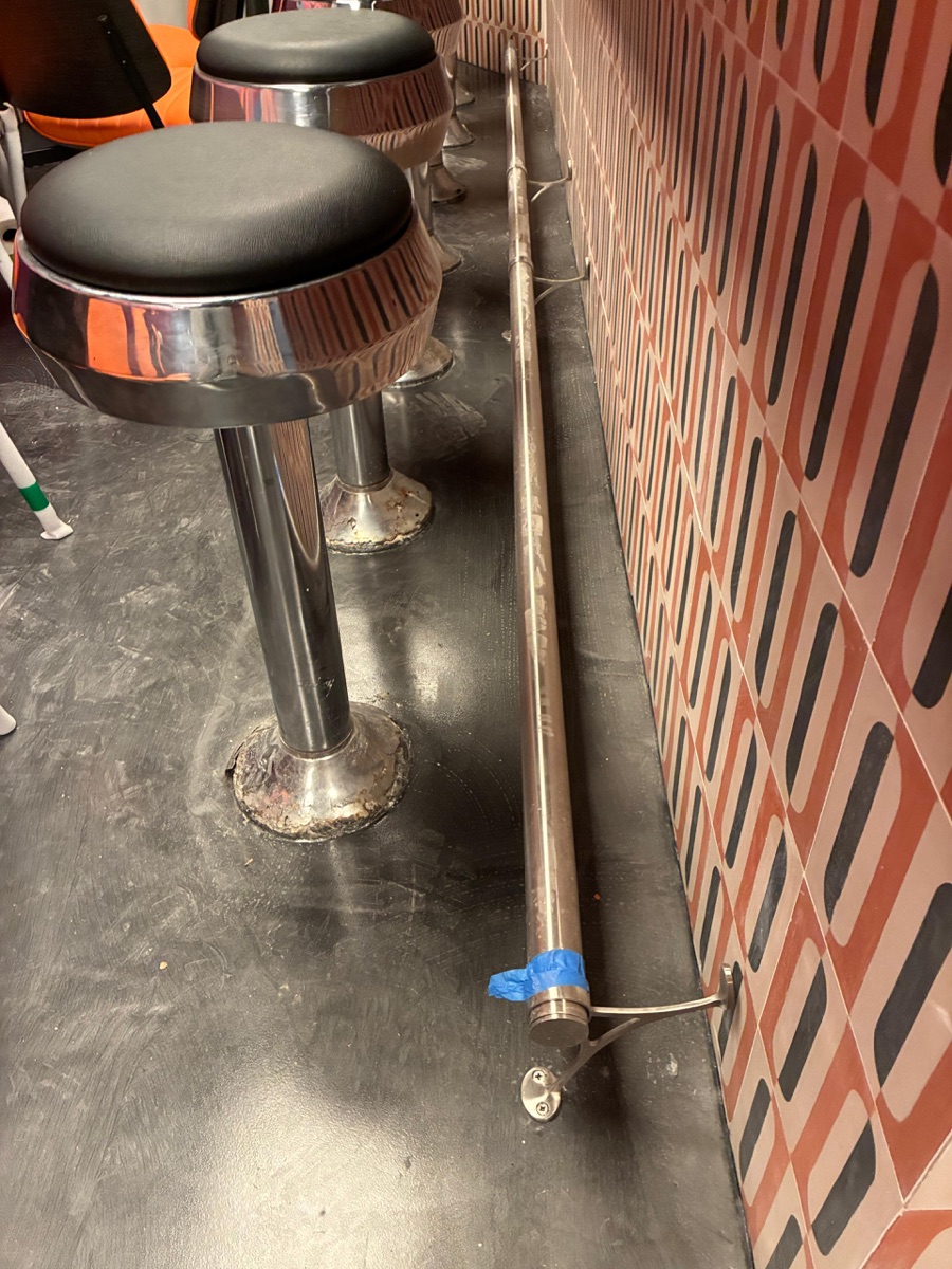 Commercial plumbing repair under bar